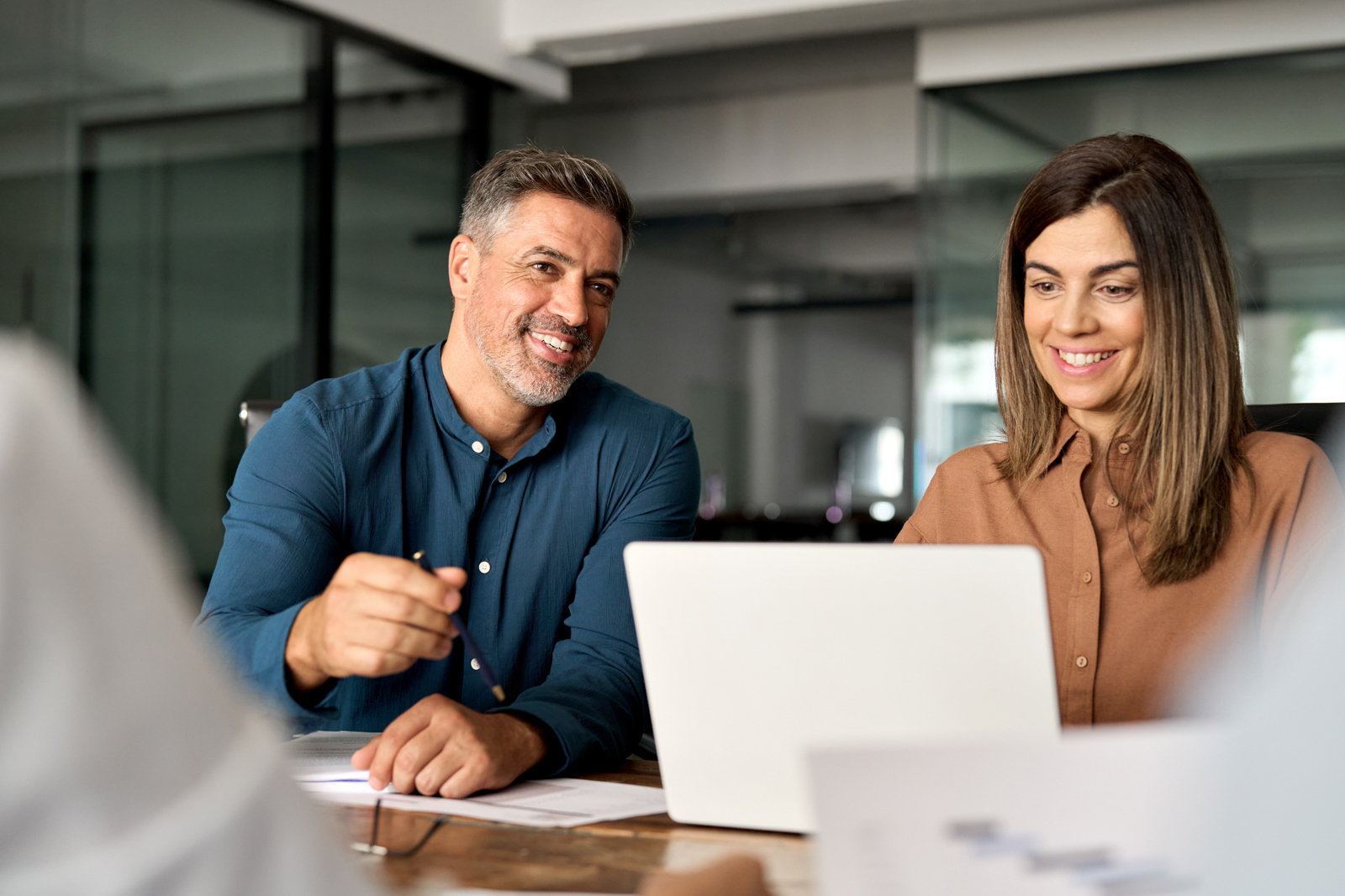 Two people engaging in meeting room
